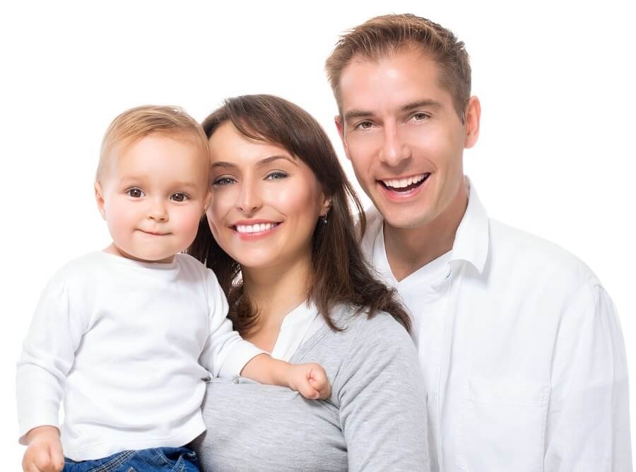 Happy smiling family with baby