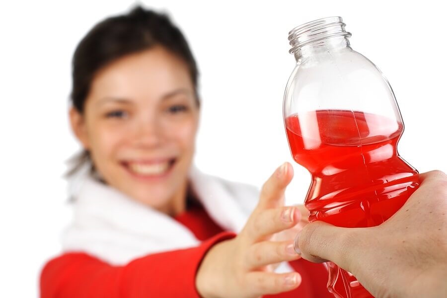 Woman reaching for sports drink