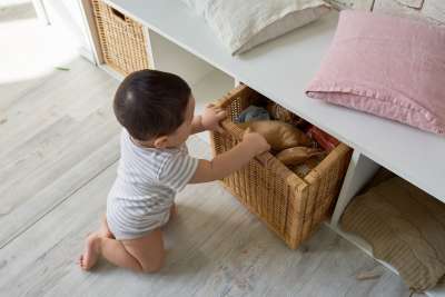 secret organizational drawer in baby's room